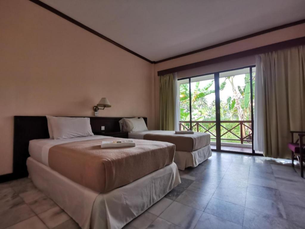 Oyo 89972 Borneo Paradise Beach Hotel Kota Kinabalu Bagian luar foto